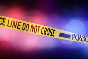 Police Line in Front of Lights