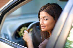 driver backing up and checking behind her