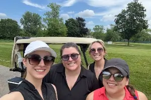 female staff from Greg Monforton & Partners at Windsor charity golf tournament 
