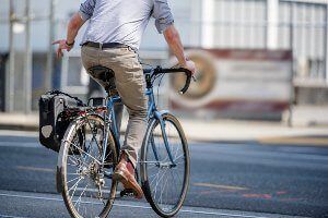 bicyclist signaling a turn