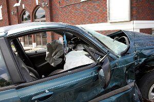 totaled car after building crash