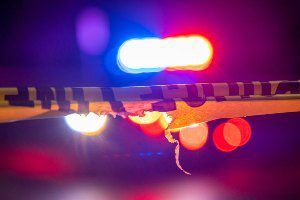 police car lights with yellow tape
