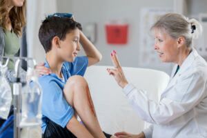 doctor holding up fingers