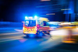 ambulance racing to hospital at night