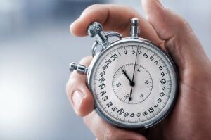 holding stopwatch