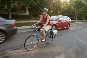 riding bike with cars